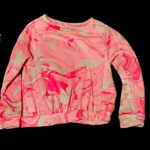 pink children’s sweater